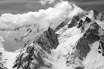 Image showing Black and white winter mountains in clouds