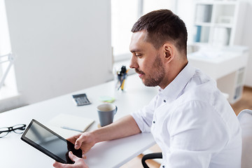 Image showing businessman with tablet pc at office