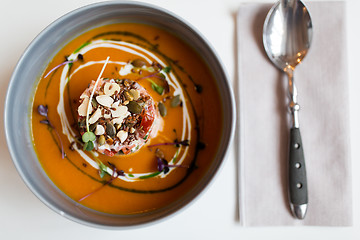 Image showing close up of vegetable pumpkin-ginger soup in bowl