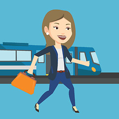 Image showing Businesswoman at train station vector illustration