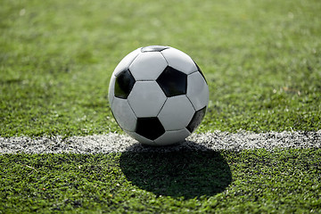 Image showing soccer ball on football field marking line