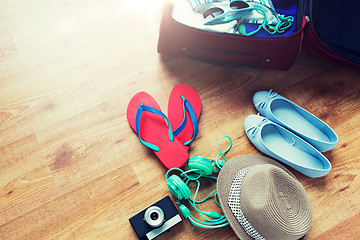 Image showing close up of travel bag with clothes and stuff