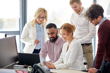 Image showing business team with tablet pc computer in office