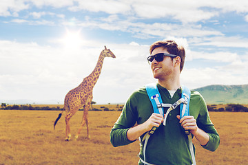 Image showing happy man with backpack traveling in africa