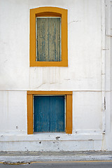 Image showing abandoned wooden house with boarded up windows