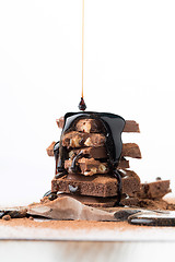 Image showing Chocolate tower with watered syrup