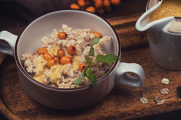 Image showing oatmeal with sea buckthorn