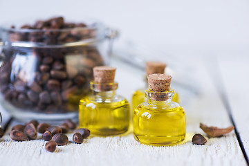 Image showing The cedar oil in a glass bottle