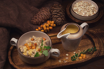 Image showing oatmeal with sea buckthorn