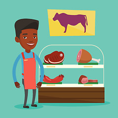 Image showing Butcher offering fresh meat in butchershop.