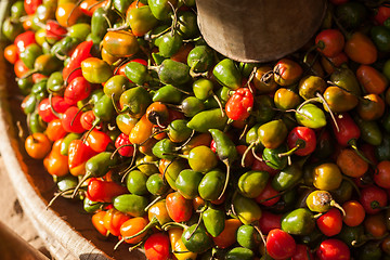 Image showing Red, yellow, and green chili peppers