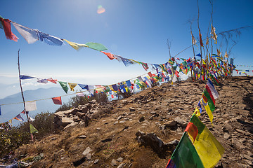 Image showing Buddhist prayer flags on a mountaintop in the Himalayas