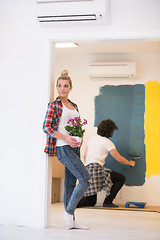 Image showing happy young couple doing home renovations