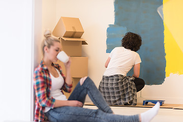 Image showing young couple doing home renovations