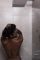 Image showing African American woman in the shower