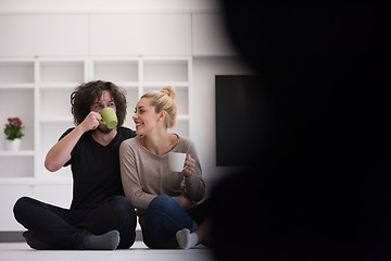 Image showing young couple in their new home