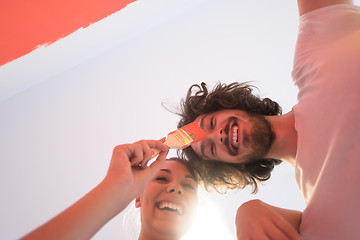 Image showing couple painting interior wall