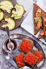 Image showing bread with red salmon caviar 