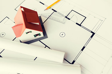 Image showing close up of house model on architectural blueprint