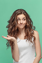 Image showing The young woman\'s portrait with happy emotions