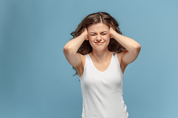 Image showing The young woman\'s portrait with pain emotions