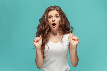 Image showing Portrait of young woman with shocked facial expression