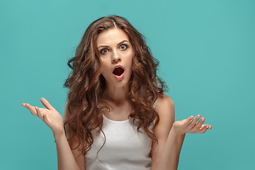 Image showing Portrait of young woman with shocked facial expression