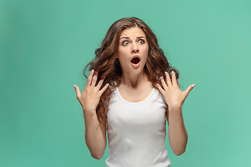 Image showing Portrait of young woman with shocked facial expression