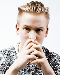 Image showing young handsome teenage hipster guy posing emotional, happy smiling against white background isolated, lifestyle people concept