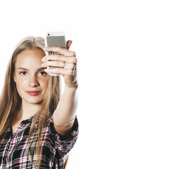 Image showing cute teenage girls making selfie isolated