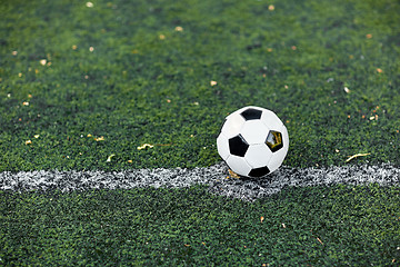 Image showing soccer ball on football field marking line