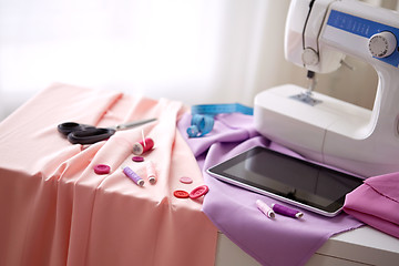 Image showing sewing machine, tablet pc, scissors and ruler