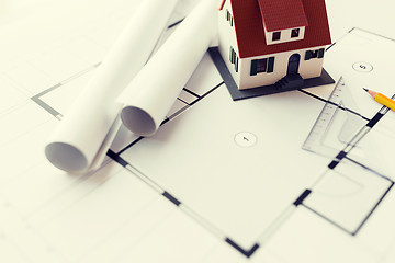 Image showing close up of house model on architectural blueprint