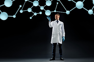 Image showing scientist in lab coat with molecules