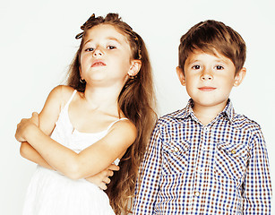 Image showing little cute boy and girl hugging playing on white background, happy smiling family, lifestyle people concept 