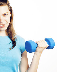 Image showing young pretty brunette woman with blue dumbbell isolated cheerful smiling, part of body, diet people concept on white background