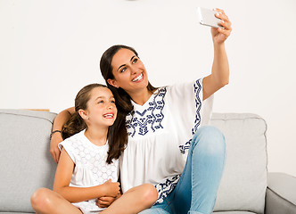 Image showing Mom and Daughter making a selfie