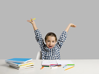 Image showing Little girl making drawings