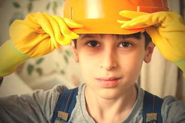 Image showing boy in a construction helmet