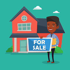 Image showing Real estate agent offering house.