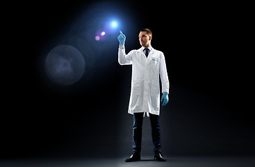 Image showing doctor or scientist in lab coat with light