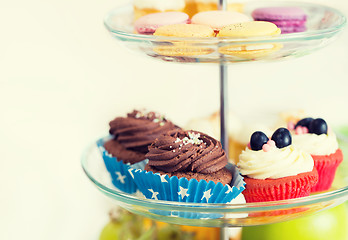 Image showing close up of cake stand with cupcakes and cookies