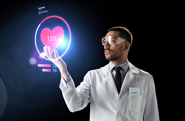 Image showing doctor or scientist with heart rate projection