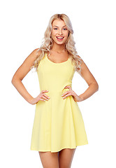 Image showing happy smiling beautiful young woman in dress