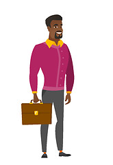 Image showing African-american business man holding briefcase.