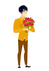 Image showing Asian businessman holding a bouquet of flowers