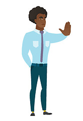 Image showing Caucasian businessman showing stop hand gesture.