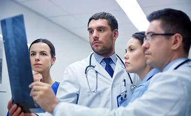 Image showing group of doctors looking at x-ray scan image