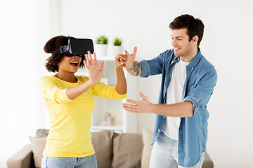 Image showing happy couple with virtual reality headset at home