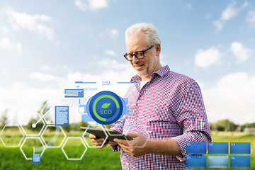 Image showing senior man with tablet pc computer at county